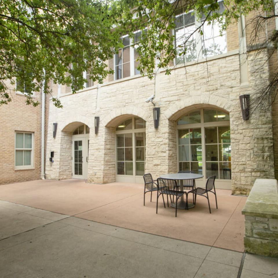 Outside seating area in Basil Moreau Hall