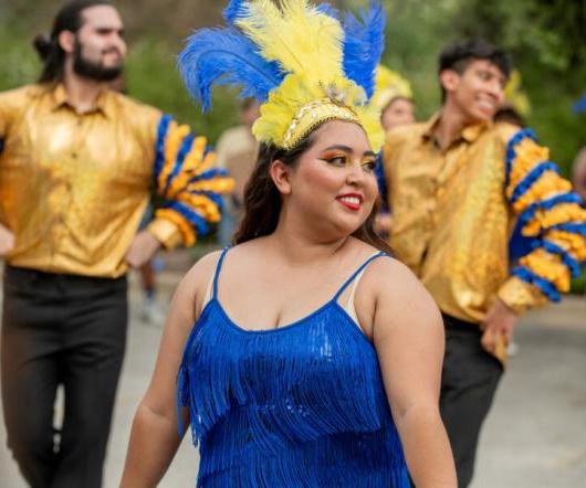 Ballet Folklorico members wear blue and gold while performing during homecoming.