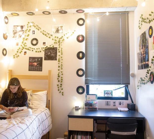 Student studies in her dorm room