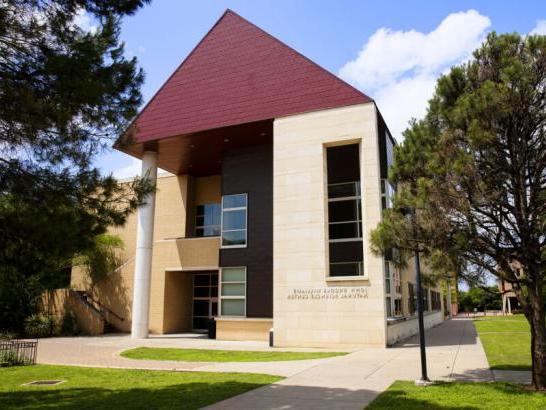 The exterior of John Brooks Williams Natural Sciences Center - North, framed by trees.