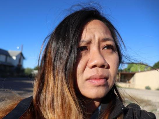 A close-up selfie of a contemplative-looking student